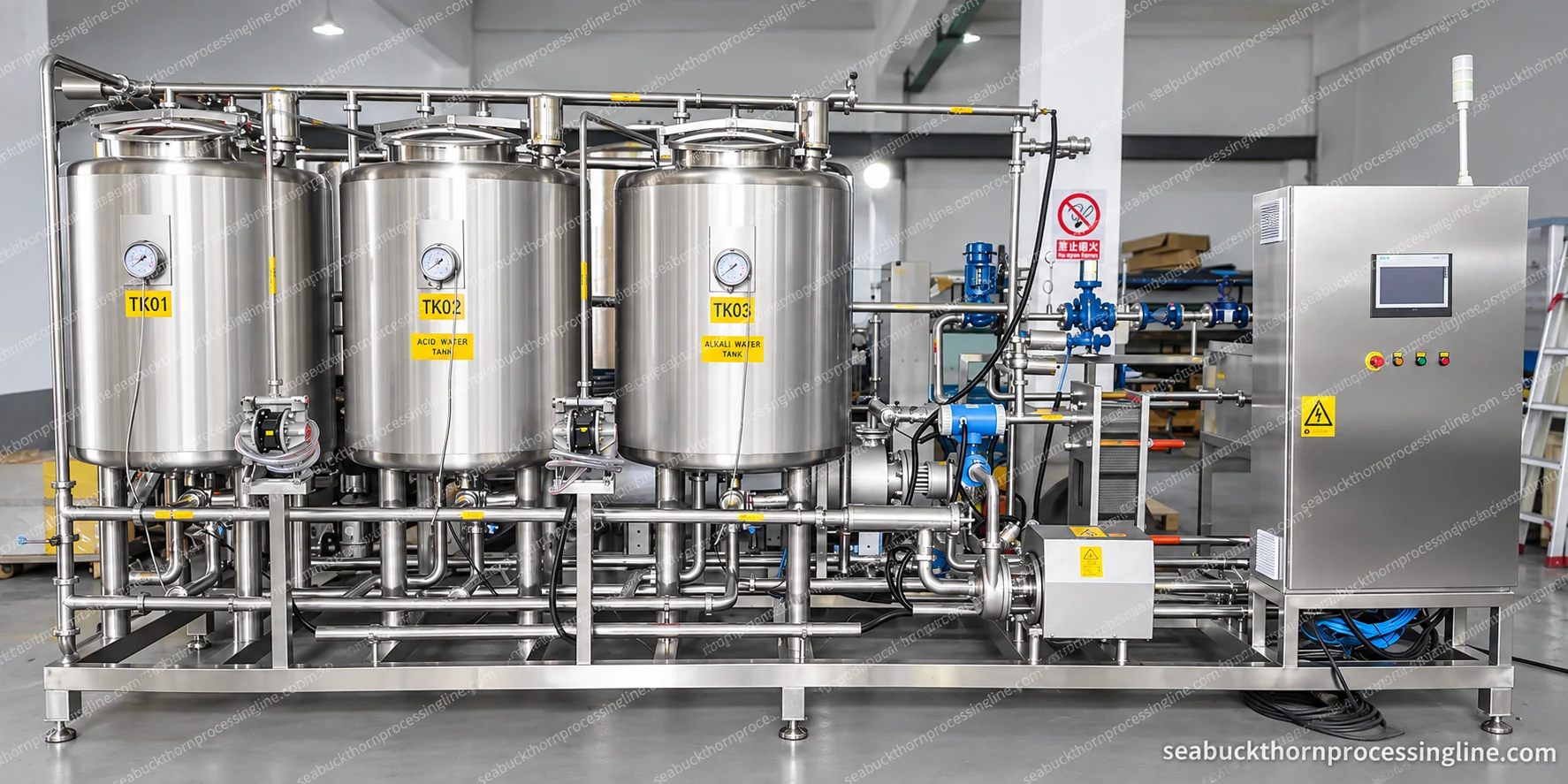 Three-tank CIP skid with pumps, pipework, a heating section and a control cabinet
